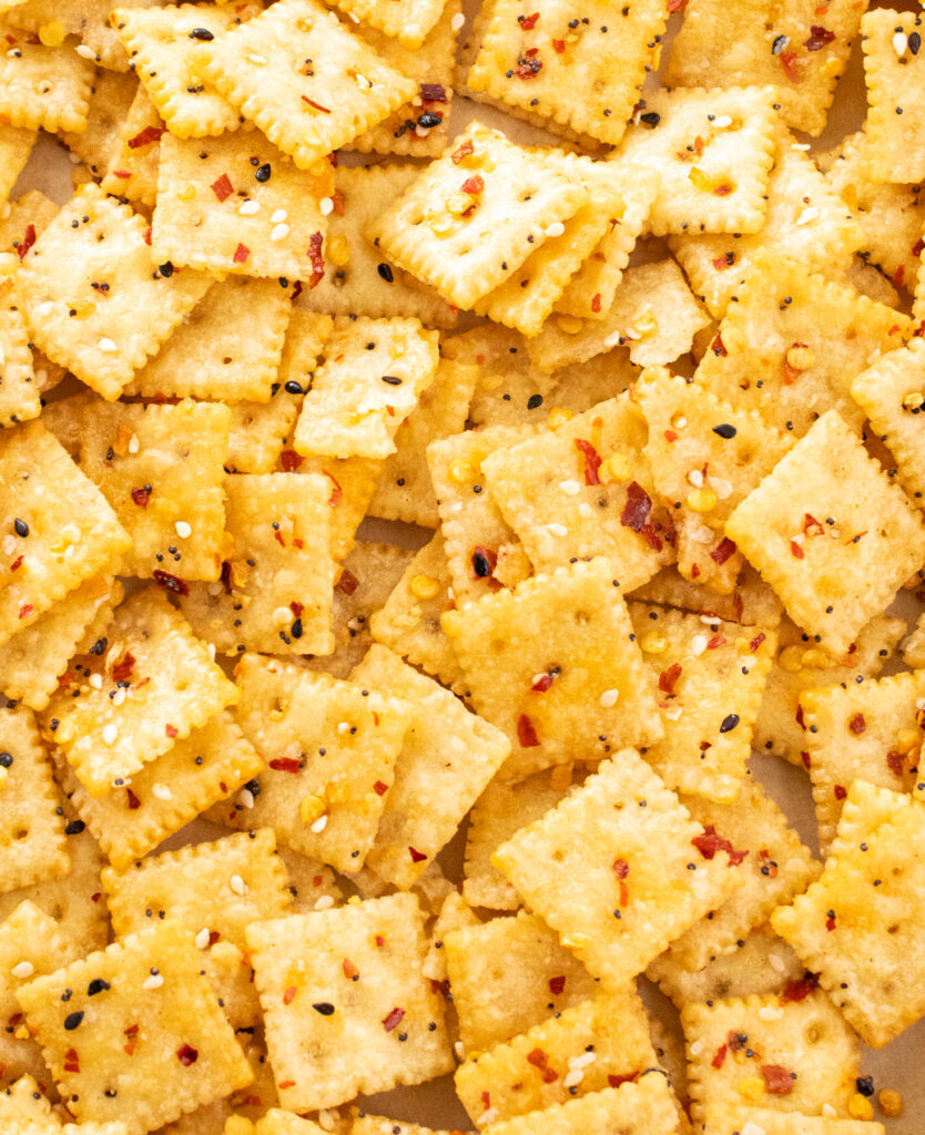 Overhead close up picture of spicy everything mini saltine snack crackers.