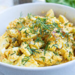 Close up of the Best Egg Salad Recipe with fresh snipped dill weed