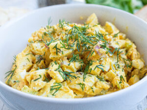 Close up of the Best Egg Salad Recipe with fresh snipped dill weed