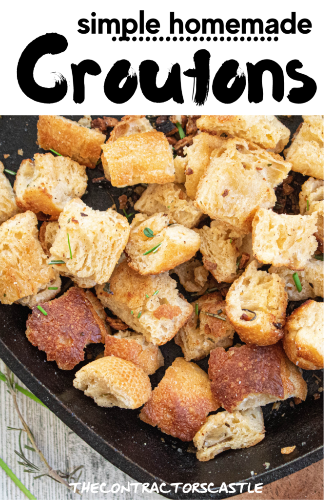pinterest pin of close up of simple homemade croutons with fresh herbs in a cast iron skillet