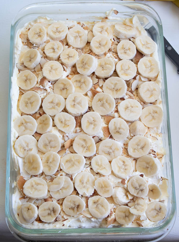 Layer of banana slices on top of almond-cookie mixture.